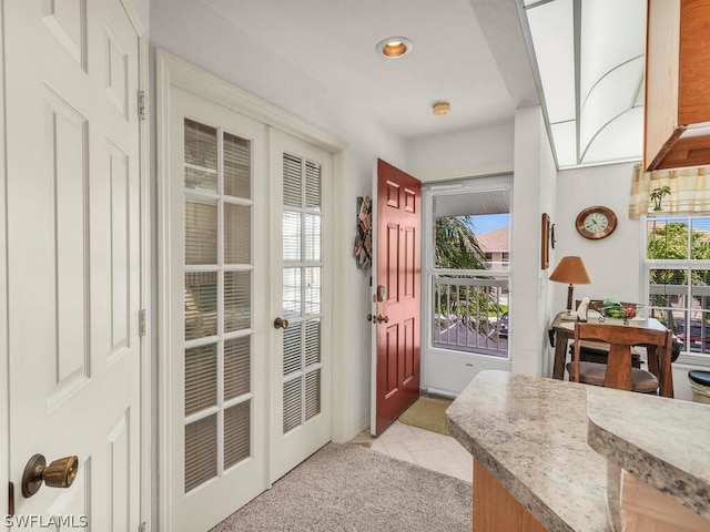 interior space featuring light tile floors