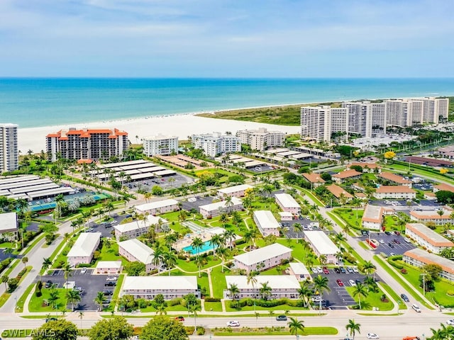 bird's eye view with a view of the beach and a water view