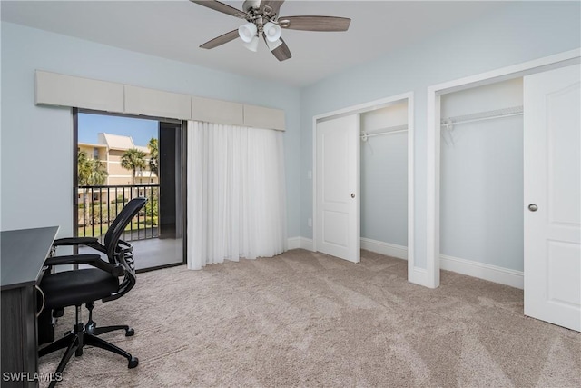 carpeted office with ceiling fan