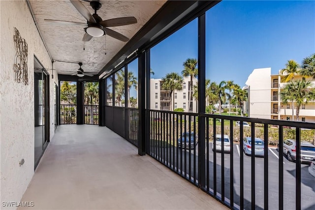 balcony featuring ceiling fan