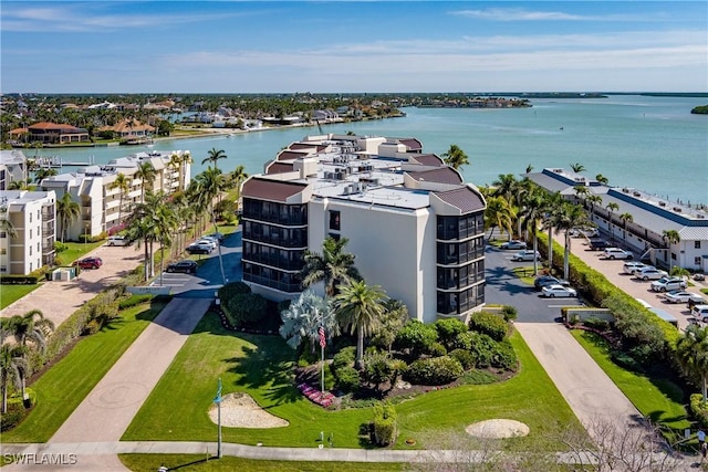 drone / aerial view with a water view