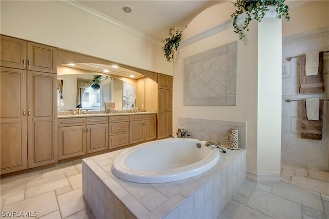 bathroom featuring a sink, double vanity, a garden tub, and crown molding