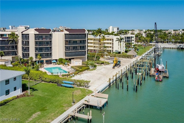 birds eye view of property featuring a water view