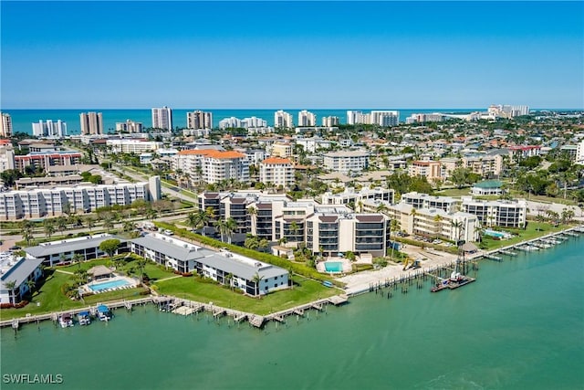 bird's eye view featuring a city view and a water view