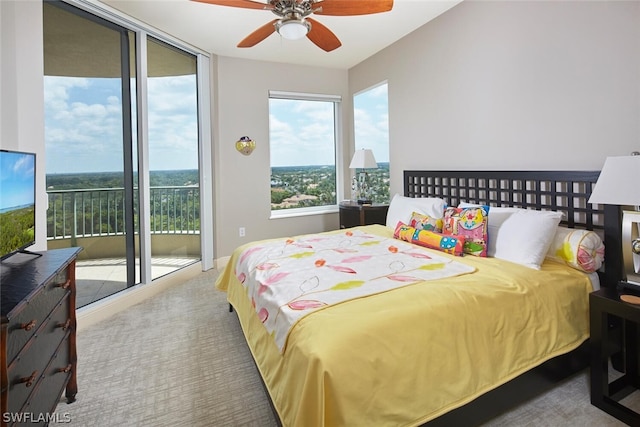 bedroom featuring carpet, access to outside, and ceiling fan