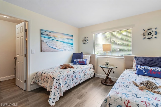 bedroom featuring dark hardwood / wood-style floors