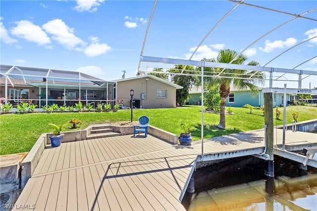 dock area with a yard and a lanai