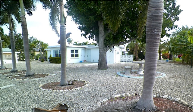 view of front of house with a patio area