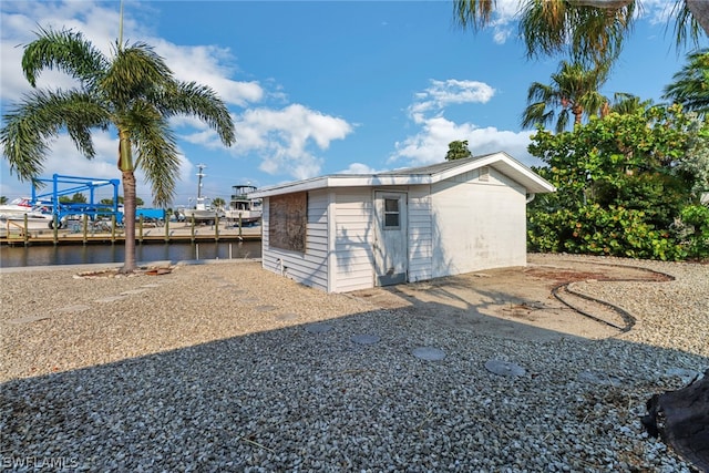 view of outdoor structure with a water view