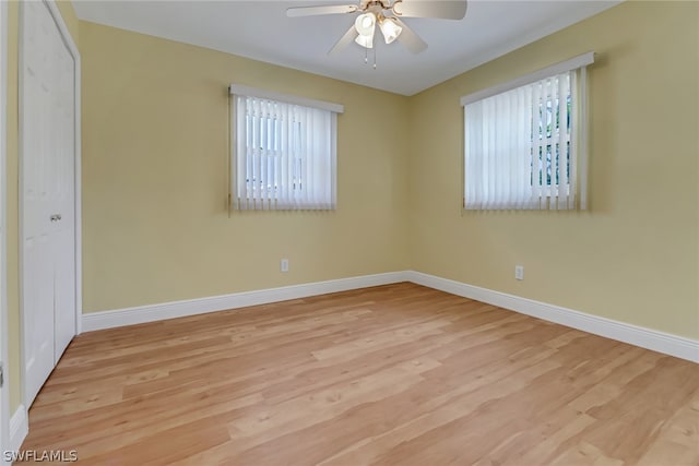 unfurnished room featuring ceiling fan and light hardwood / wood-style floors