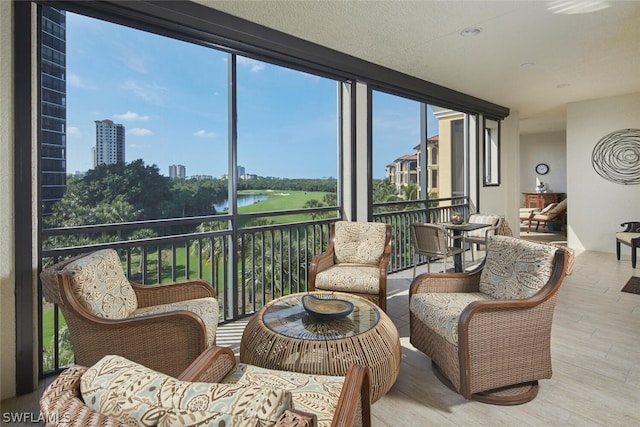 sunroom with a water view