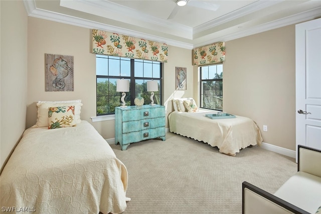 bedroom with multiple windows, ornamental molding, light colored carpet, and ceiling fan