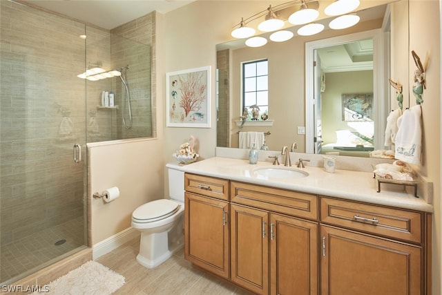 bathroom featuring vanity, walk in shower, toilet, and ornamental molding