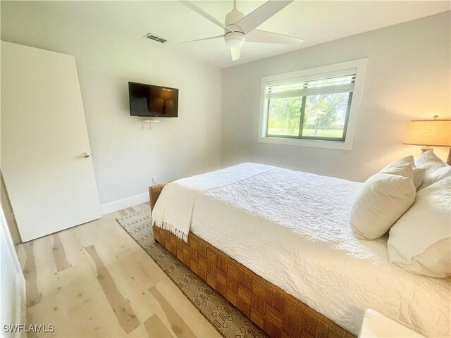 bedroom featuring ceiling fan and light wood-type flooring