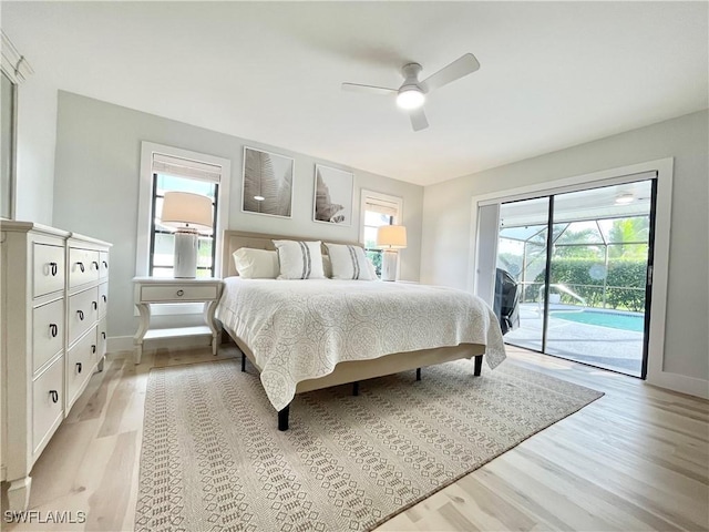 bedroom featuring access to outside, ceiling fan, and light wood-type flooring