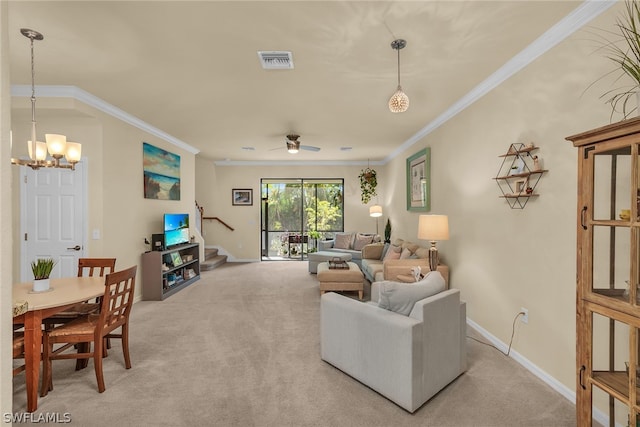 living room featuring ceiling fan with notable chandelier, light carpet, and crown molding