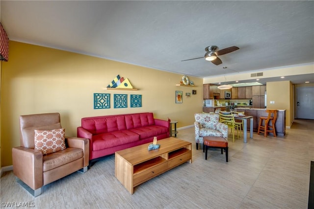 living room with ceiling fan