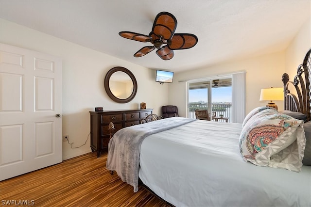 bedroom with access to outside, ceiling fan, and hardwood / wood-style flooring