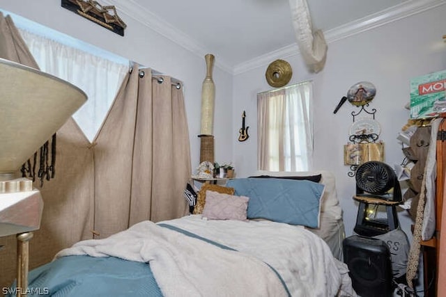 bedroom featuring ornamental molding