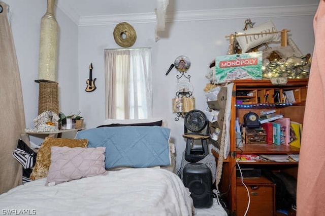 bedroom with crown molding