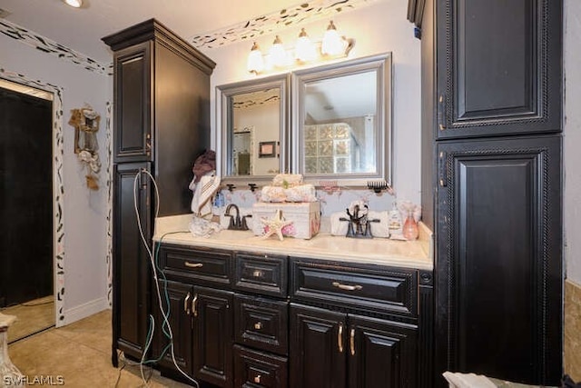 bathroom with tile flooring and double sink vanity