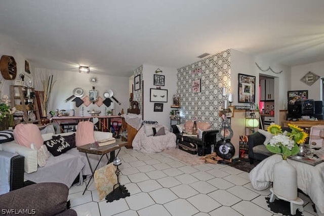 living room featuring light tile floors