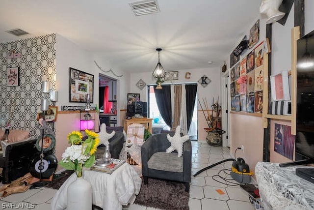 bedroom featuring light tile floors