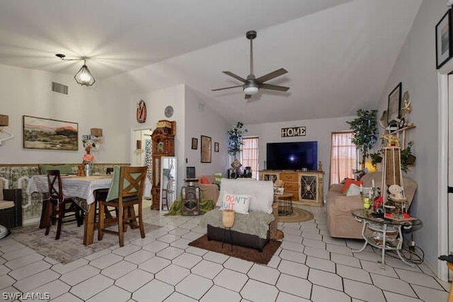 living room with high vaulted ceiling, ceiling fan, and light tile flooring