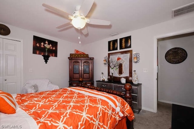 bedroom featuring a closet, ceiling fan, and carpet flooring