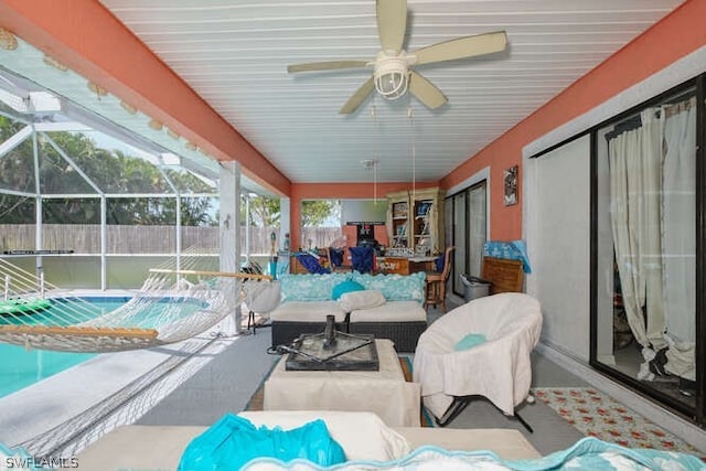 sunroom / solarium with ceiling fan