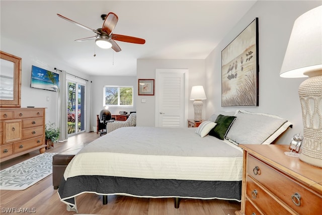 bedroom featuring light hardwood / wood-style flooring and ceiling fan