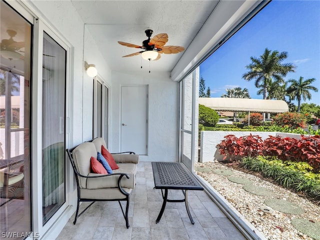 exterior space with ceiling fan