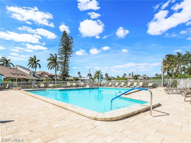 view of pool featuring a patio