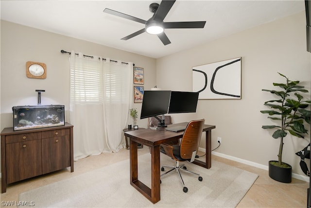 office featuring ceiling fan and light tile floors