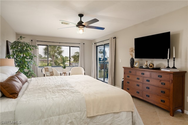 tiled bedroom featuring ceiling fan and access to outside