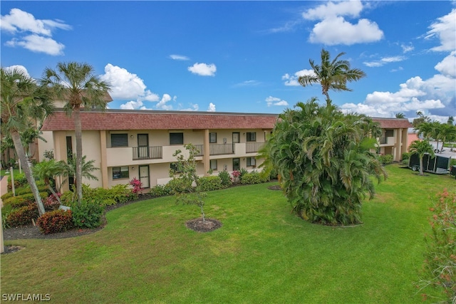 view of property featuring central AC unit