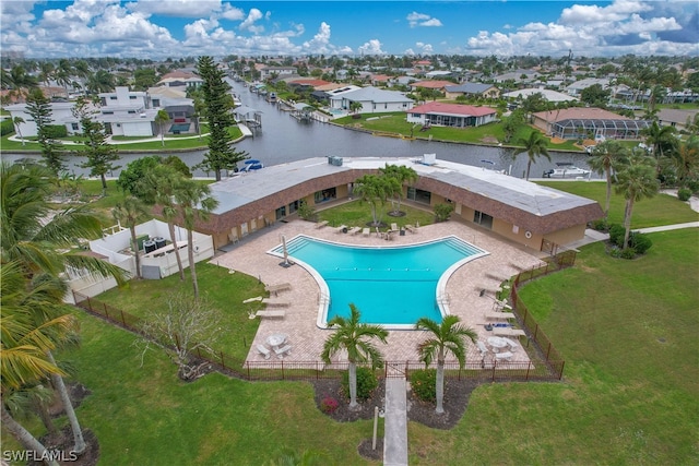 view of pool with a yard and a patio