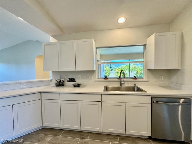 kitchen with sink, white cabinetry, and dishwasher