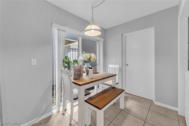 dining room with light tile floors