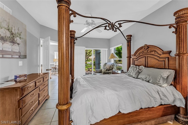 tiled bedroom featuring access to exterior