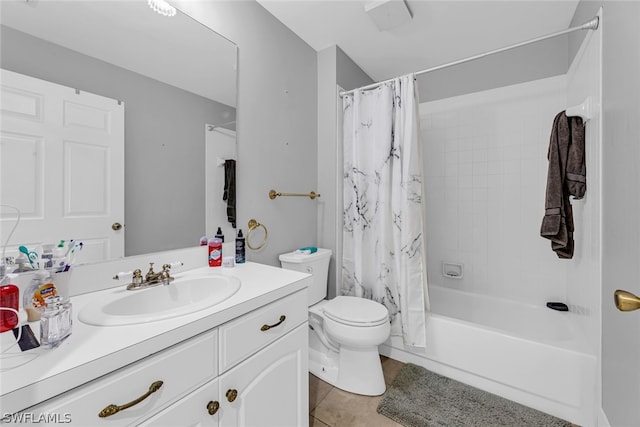 full bathroom featuring shower / tub combo with curtain, large vanity, tile floors, and toilet