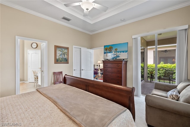 bedroom featuring ceiling fan, access to outside, light colored carpet, ensuite bath, and ornamental molding