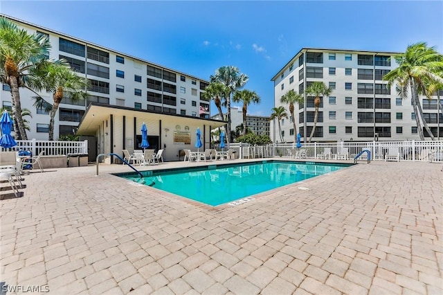 view of swimming pool with a patio area