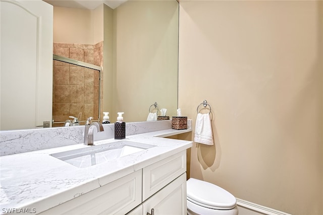 bathroom featuring toilet and oversized vanity