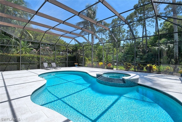 view of swimming pool with glass enclosure, a patio area, and an in ground hot tub