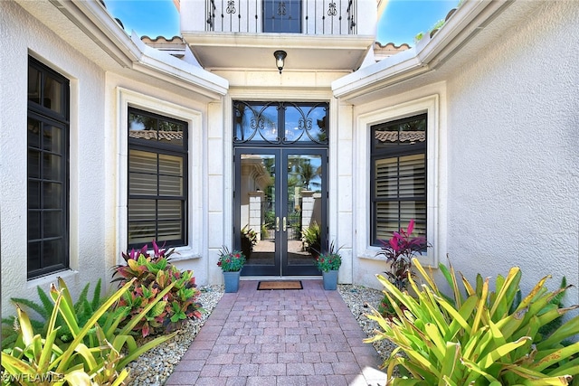 property entrance featuring french doors