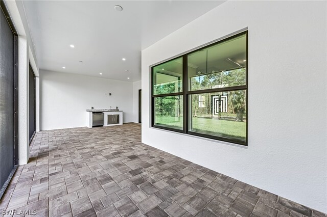 interior space featuring dark tile flooring