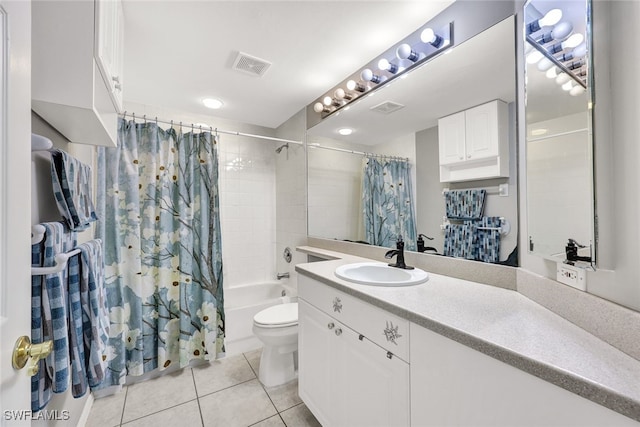 full bathroom featuring tile patterned floors, vanity, shower / tub combo, and toilet