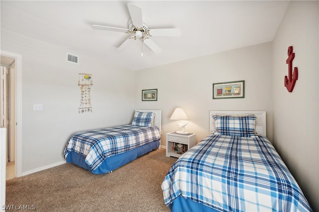 carpeted bedroom featuring ceiling fan