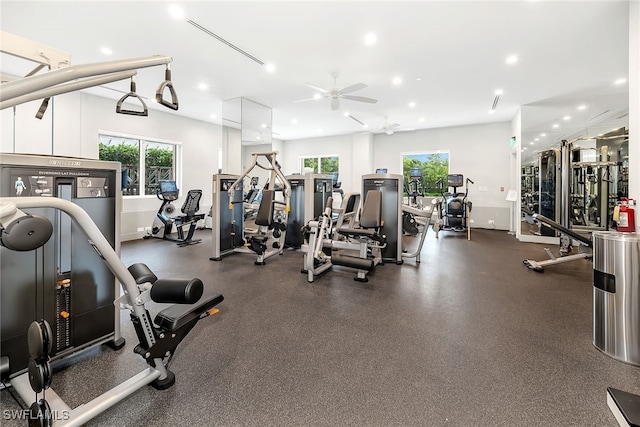 gym with a wealth of natural light and ceiling fan